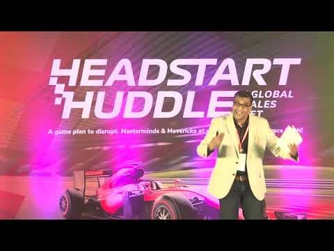 Rajiv Chelladurai speaking at the Global Sales Meet(HEADSTART HUDDLE) of 3i Infotech