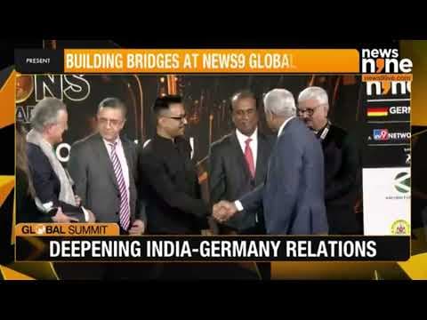 Ajit Isaac receiving the Global Workforce Icon Award at News9 Global Summit2024 - Stuttgart, Germany